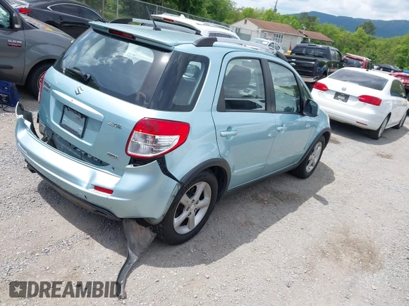 2009 Suzuki SX4 Touring AWD z VIN JS2YB417096201672, wystawiony jako IAAI lot #42209018 z przebiegiem 64 879 mil mil oraz . Historia ofert i sprzedaży dostępna na DreamBid. Obrazek 4.