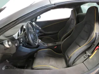 2016 McLaren 650S z VIN SBM11FAA1GW006061, wystawiony jako Copart lot #73406814 z przebiegiem 16 999 mil mil oraz Szkody całkowita. Historia ofert i sprzedaży dostępna na DreamBid. Obrazek 9.