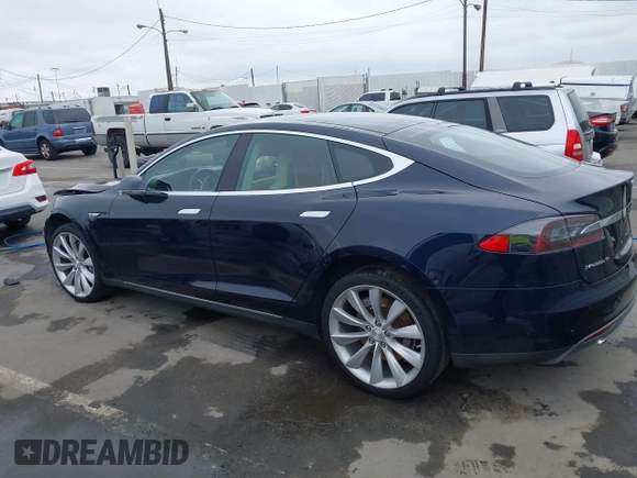 2014 Tesla Model S 60 with VIN 5YJSA1H10EFP30234, listed as a IAAI auction lot 42182249 with 186,654 mi miles and . Bid and sale history available at DreamBid. Image 14.