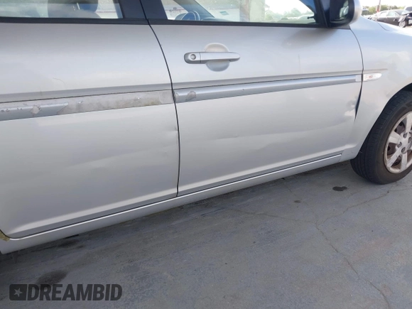 2007 Hyundai Accent GLS with VIN KMHCN46C27U138872, listed as a IAAI auction lot 42144670 with 81,260 mi miles. Bid and sale history available at carsss.com. Image 6.
