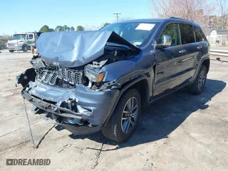 2019 Jeep Grand Cherokee Limited X with VIN 1C4RJFBG4KC812565, listed as a IAAI auction lot 41779418 with 100,296 mi miles. Bid and sale history available at carsss.com. Image 17.