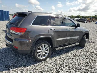 2017 Jeep Grand Cherokee Limited 75th Anniversary with VIN 1C4RJFBT0HC781742, listed as a Copart auction lot 55928265 with 122,277 mi miles and Salvage title. Bid and sale history available at DreamBid. Image 3.