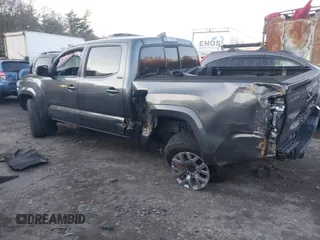 2017 Toyota Tacoma SR5 with VIN 3TMCZ5AN4HM104459, listed as a IAAI auction lot 41207997 with 80,103 mi miles and . Bid and sale history available at DreamBid. Image 3.