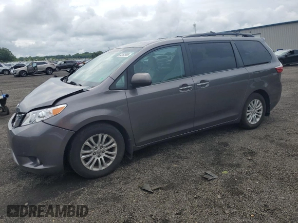 2015 Toyota Sienna XLE z VIN 5TDYK3DC1FS574647, wystawiony jako Copart lot #64163905 z przebiegiem 144 403 mil mil oraz Szkoda całkowita • Salvage title. Historia ofert i sprzedaży dostępna na DreamBid. Obrazek 1.