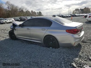 2020 BMW M5 with VIN WBSJF0C01LCD17721, listed as a Copart auction lot 79543404 with 0 mi miles and Salvage Title. Bid and sale history available at carsss.com. Image 2.