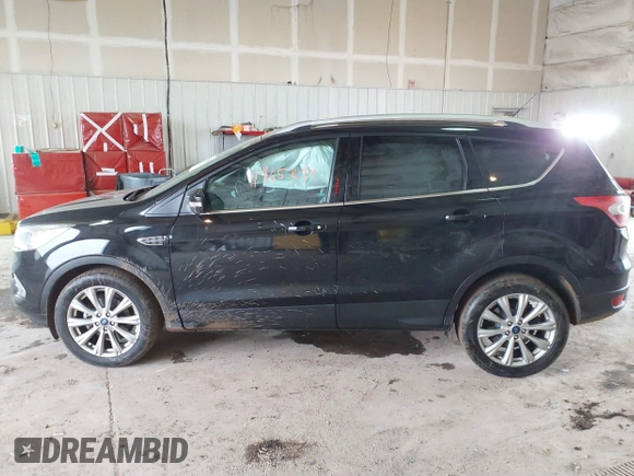 2017 Ford Escape Titanium with VIN 1FMCU0JD2HUE71179, listed as a IAAI auction lot 41465849 with 95,426 mi miles. Bid and sale history available at carsss.com. Image 14.