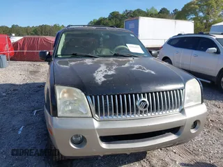 2003 Mercury Mountaineer Convenience z VIN 4M2DU66W13ZJ05239, wystawiony jako IAAI lot #42062881 z przebiegiem 292 631 mil mil oraz . Historia ofert i sprzedaży dostępna na DreamBid. Obrazek 6.