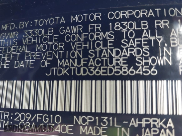 2014 Toyota Yaris L with VIN JTDKTUD36ED586456, listed as a IAAI auction lot 41888730 with 92,742 mi miles. Bid and sale history available at carsss.com. Image 9.