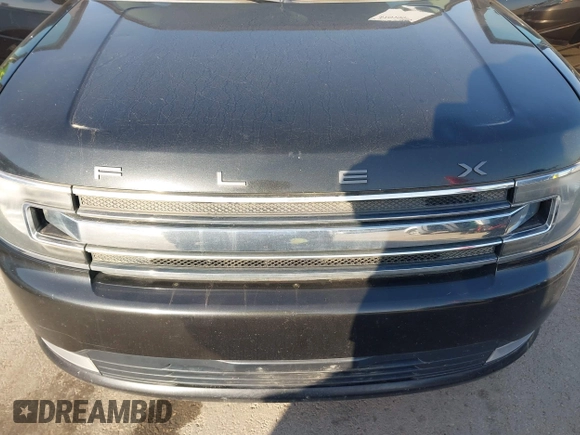 2013 Ford Flex SEL with VIN 2FMHK6C89DBD33136, listed as a IAAI auction lot 42019929 with 190,574 mi miles. Bid and sale history available at carsss.com. Image 6.