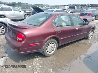 2001 Nissan Maxima SE with VIN JN1CA31D31T813090, listed as a IAAI auction lot 42389423 with 144,015 mi miles and . Bid and sale history available at DreamBid. Image 4.