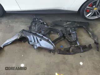 2024 Ferrari Roma z VIN ZFF98RNA4R0301164, wystawiony jako Copart lot #61120144 z przebiegiem 1263 mil mil oraz Nie do naprawy. Historia ofert i sprzedaży dostępna na DreamBid. Obrazek 12.