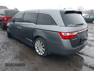2012 Honda Odyssey Touring with VIN 5FNRL5H98CB089871, listed as a IAAI auction lot 41351447 with 999,999 mi miles. Bid and sale history available at carsss.com. Image 3.