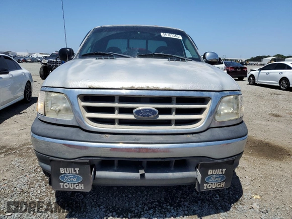 2001 Ford F-150 XL with VIN 1FTRX17W11NA24623, listed as a Copart auction lot 56767345 with 201,959 mi miles and Salvage title. Bid and sale history available at DreamBid. Image 5.