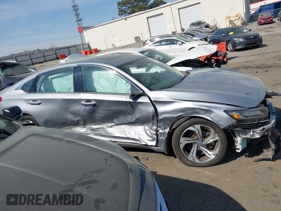 2018 Honda Accord EX-L z VIN 1HGCV2F57JA014214, wystawiony jako IAAI lot #41909287 z przebiegiem 81 388 mil mil oraz . Historia ofert i sprzedaży dostępna na DreamBid. Obrazek 12.