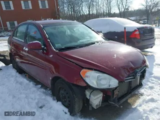 2011 Hyundai Accent GLS with VIN KMHCN4AC1BU554976, listed as a IAAI auction lot 41487221 with 221,496 mi miles. Bid and sale history available at carsss.com. Image 1.