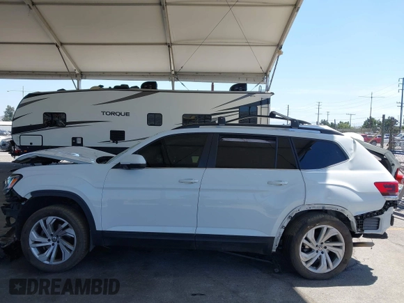 2021 Volkswagen Atlas SE z VIN 1V2HR2CA8MC514027, wystawiony jako IAAI lot #42260413 z przebiegiem 37 687 mil mil oraz . Historia ofert i sprzedaży dostępna na DreamBid. Obrazek 14.