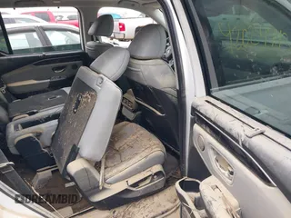 2023 Honda Pilot Elite with VIN 5FNYG1H80PB020937, listed as a IAAI auction lot 42024743 with 20,740 mi miles and . Bid and sale history available at DreamBid. Image 8.