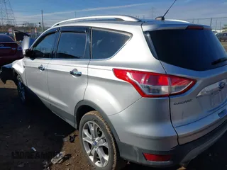 2015 Ford Escape Titanium with VIN 1FMCU0J93FUC02844, listed as a IAAI auction lot 41531293 with 115,392 mi miles and . Bid and sale history available at DreamBid. Image 3.