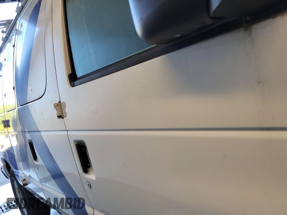 2012 Ford Econoline Cargo Commercial with VIN 1FTNE2EL9CDB21032, listed as a IAAI auction lot 42787135 with 106,406 mi miles and . Bid and sale history available at DreamBid. Image 22.