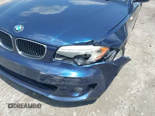2012 BMW 1 Series 128i with VIN WBAUN1C56CVR00132, listed as a IAAI auction lot 42387792 with 122,741 mi miles and . Bid and sale history available at DreamBid. Image 6.