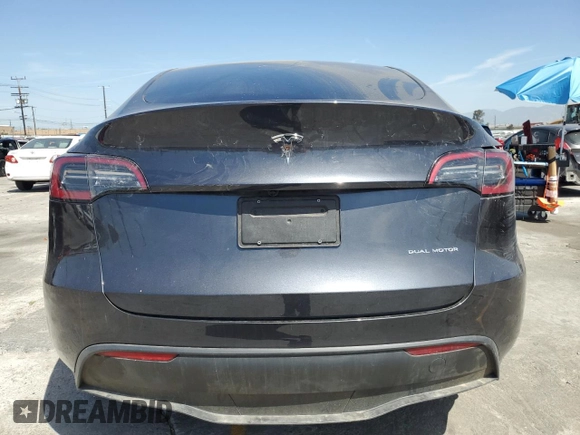 2024 Tesla Model Y Long Range with VIN 7SAYGDEEXRA237667, listed as a Copart auction lot 58260635 with Not provided miles and Salvage title. Bid and sale history available at DreamBid. Image 6.