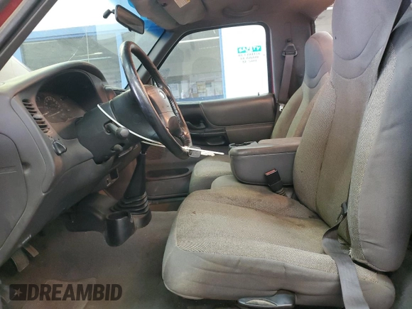 2001 Ford Ranger XL with VIN 1FTYR10C61TA40124, listed as a Copart auction lot 48943325 with 196,810 mi miles and Salvage title. Bid and sale history available at DreamBid. Image 7.