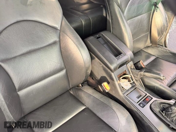 2000 BMW M5 z VIN WBSDE9343YBZ94710, wystawiony jako Copart lot #56716935 z przebiegiem 169 877 mil mil oraz Tytuł czysty. Historia ofert i sprzedaży dostępna na DreamBid. Obrazek 9.