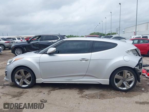 2013 Hyundai Veloster Turbo z VIN KMHTC6AE2DU122273, wystawiony jako IAAI lot #42174272 z przebiegiem 157 152 mil mil oraz . Historia ofert i sprzedaży dostępna na DreamBid. Obrazek 15.