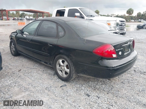 2003 Ford Taurus SES Standard with VIN 1FAFP55223A152802, listed as a IAAI auction lot 42390857 with 141,673 mi miles and . Bid and sale history available at DreamBid. Image 3.