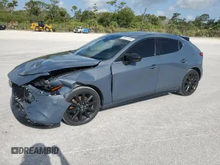 2021 Mazda 3 Premium Plus with VIN JM1BPBNYXM1403126, listed as a Copart auction lot 59971535 with 56,952 mi miles and Salvage title. Bid and sale history available at DreamBid. Image 1.