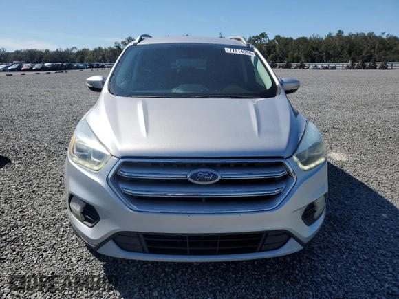 2017 Ford Escape Titanium with VIN 1FMCU0J90HUB04082, listed as a Copart auction lot 77814994 with 135,674 mi miles and Salvage Title. Bid and sale history available at carsss.com. Image 5.
