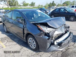 2017 Toyota Prius Two with VIN JTDKBRFU0H3540718, listed as a IAAI auction lot 42232650 with 98,932 mi miles and . Bid and sale history available at DreamBid. Image 1.