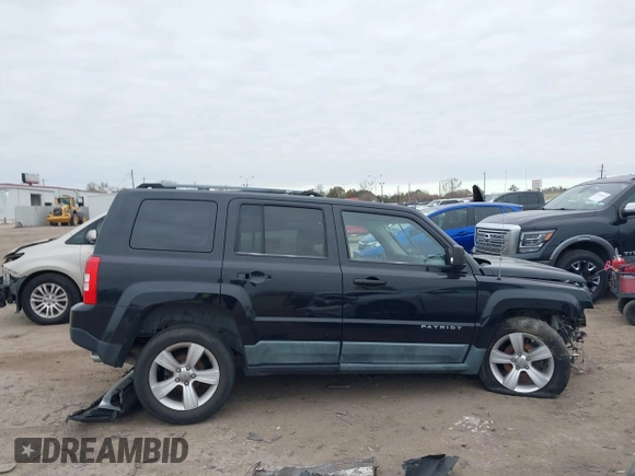 2011 Jeep Patriot Latitude X with VIN 1J4NF4GBXBD150299, listed as a IAAI auction lot 41377619 with 86,460 mi miles and . Bid and sale history available at DreamBid. Image 14.