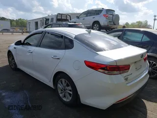 2016 Kia Optima LX with VIN KNAGT4L37G5074853, listed as a IAAI auction lot 41950918 with 151,111 mi miles. Bid and sale history available at carsss.com. Image 3.