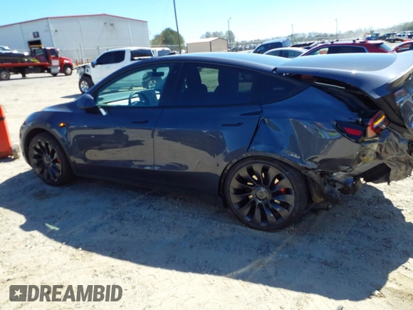 2022 Tesla Model Y Performance with VIN 7SAYGDEF9NF544205, listed as a IAAI auction lot 41825453 with 33,039 mi miles and . Bid and sale history available at DreamBid. Image 14.