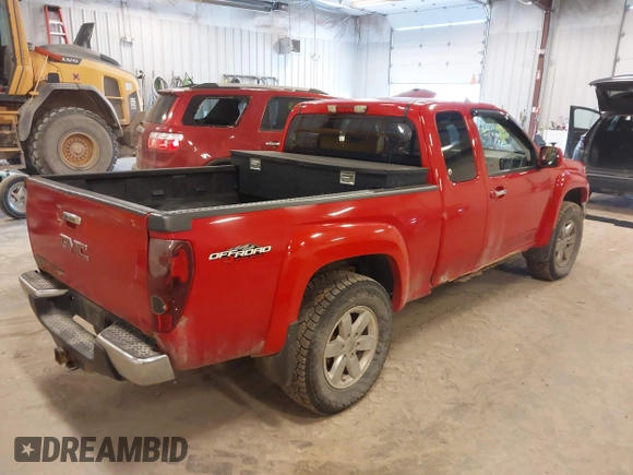 2011 GMC Canyon z VIN 1GTJ6NFE1B8109333, wystawiony jako IAAI lot #42035352 z przebiegiem 135 403 mil mil oraz . Historia ofert i sprzedaży dostępna na DreamBid. Obrazek 4.