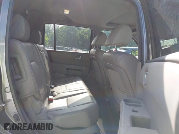 2013 Honda Pilot EX-L with VIN 5FNYF3H59DB038966, listed as a IAAI auction lot 42461394 with 142,684 mi miles and . Bid and sale history available at DreamBid. Image 8.