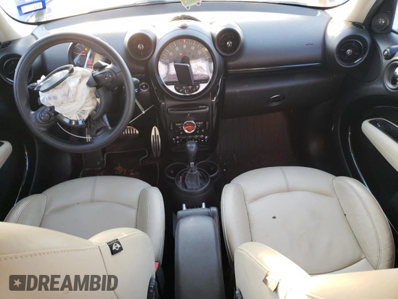 2015 MINI Countryman S with VIN WMWZC5C57FWP48606, listed as a Copart auction lot 47212255 with 104,922 mi miles and Salvage Title. Bid and sale history available at DreamBid. Image 8.