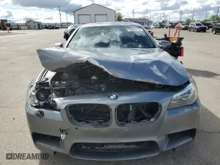 2014 BMW M5 with VIN WBSFV9C58ED097741, listed as a Copart auction lot 53825714 with 81,403 mi miles and Salvage Title. Bid and sale history available at carsss.com. Image 5.