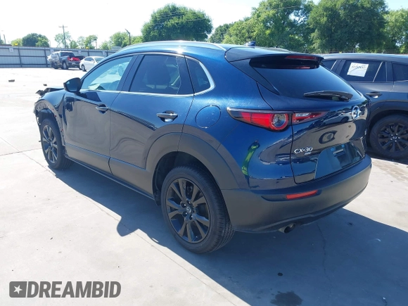2021 Mazda CX-30 Premium with VIN 3MVDMBDYXMM307047, listed as a IAAI auction lot 41974966 with 53,409 mi miles and . Bid and sale history available at carsss.com. Image 3.