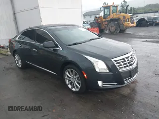 2013 Cadillac XTS Luxury with VIN 2G61R5S35D9162882, listed as a IAAI auction lot 42424190 with 64,349 mi miles and . Bid and sale history available at DreamBid. Image 1.