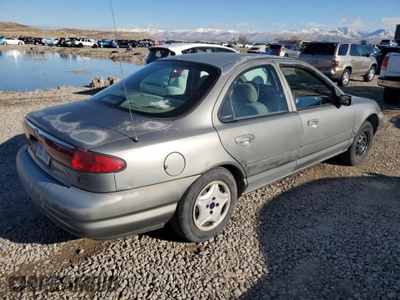 1998 Ford Contour z VIN 1FAFP66Z5WK232756, wystawiony jako Copart lot #86648364 z przebiegiem 118 176 mil mil oraz Tytuł czysty. Historia ofert i sprzedaży dostępna na DreamBid. Obrazek 3.