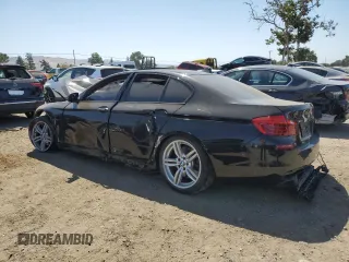 2016 BMW 5 Series 550i xDrive with VIN WBAKP9C55GD980454, listed as a Copart auction lot 59319485 with 91,424 mi miles and Salvage title. Bid and sale history available at DreamBid. Image 2.