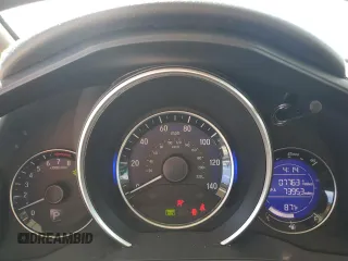 2015 Honda Fit EX-L z VIN 3HGGK5H8XFM765160, wystawiony jako Copart lot #55809025 z przebiegiem 77 631 mil mil oraz Szkoda całkowita • Salvage title. Historia ofert i sprzedaży dostępna na DreamBid. Obrazek 9.