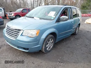 2010 Chrysler Town & Country Touring with VIN 2A4RR5D15AR415362, listed as a IAAI auction lot 41989057 with 133,406 mi miles and . Bid and sale history available at DreamBid. Image 2.