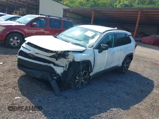 2020 Toyota RAV4 LE with VIN 2T3H1RFV1LC062449, listed as a IAAI auction lot 40064208 with 92,576 mi miles and . Bid and sale history available at DreamBid. Image 2.