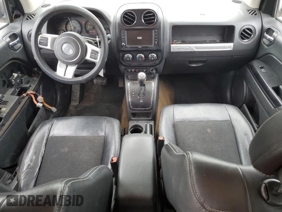 2016 Jeep Compass Sport SE z VIN 1C4NJCBA1GD634477, wystawiony jako Copart lot #50922425 z przebiegiem 141 375 mil mil oraz Szkoda całkowita • Salvage title. Historia ofert i sprzedaży dostępna na DreamBid. Obrazek 8.