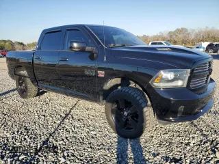2014 Ram 1500 Sport z VIN 1C6RR6MT0ES148320, wystawiony jako Copart lot #87923445 z przebiegiem 107 510 mil mil oraz Czysty tytuł • Clean title. Historia ofert i sprzedaży dostępna na DreamBid. Obrazek 4.