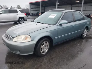 1999 Honda Civic EX z VIN 1HGEJ8643XL010821, wystawiony jako IAAI lot #41602036 z przebiegiem 165 139 mil mil oraz . Historia ofert i sprzedaży dostępna na DreamBid. Obrazek 2.