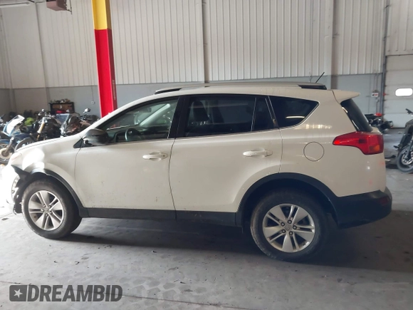 2014 Toyota RAV4 LE with VIN JTMBFREV8EJ005559, listed as a IAAI auction lot 41963080 with 126,296 mi miles and . Bid and sale history available at DreamBid. Image 14.